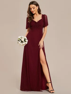 Robe de demoiselle d'honneur pailletée trapèze fente haute taille élastique manches courtes dos à lacets