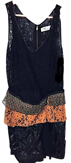 Toga Pulla Archives Japan. Mick sports lace dress